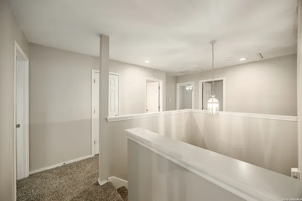 a view of entryway with kitchen