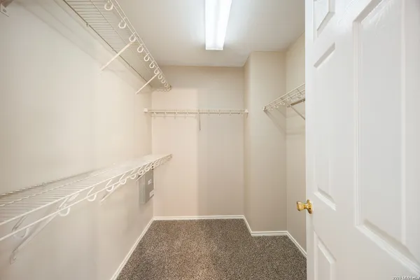 a view of an empty walk in closet