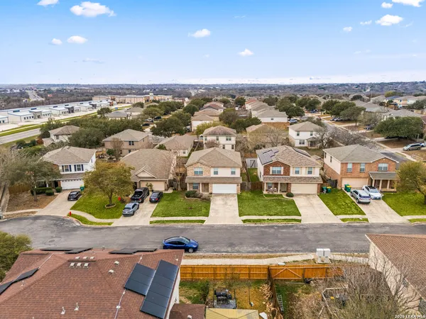 an aerial view of a residential houses