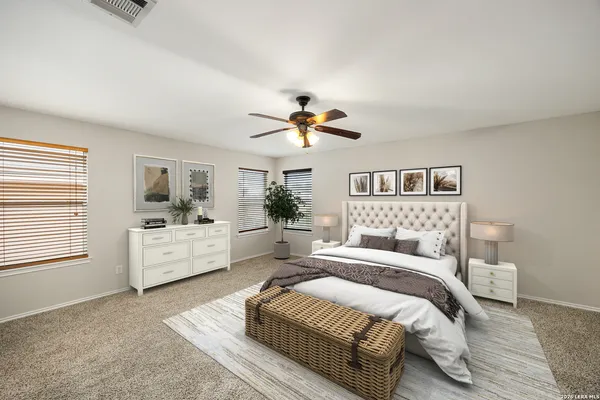 a bed room with a bed and a window