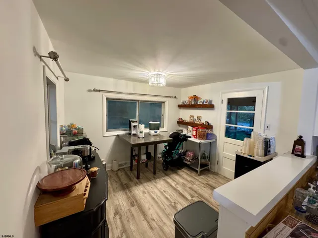 a view of a livingroom and dining room