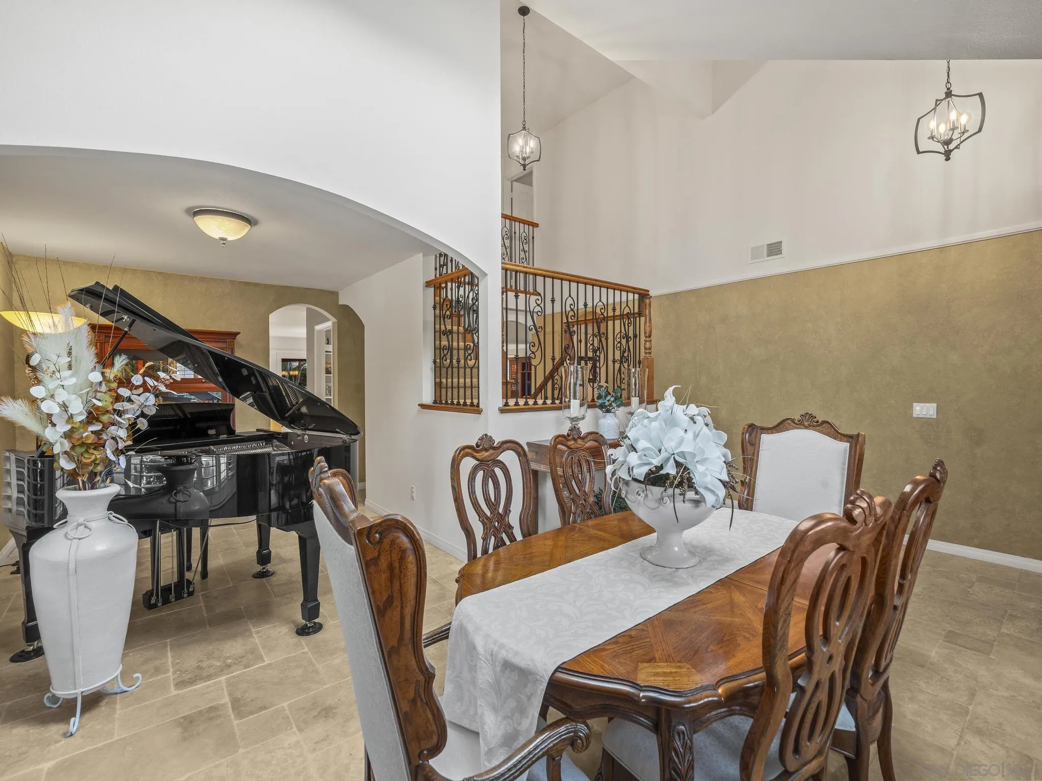 6502 La Paloma Street Carlsbad, CA 92009 - Photo 21 of 60 a dining room with furniture and wooden floor
