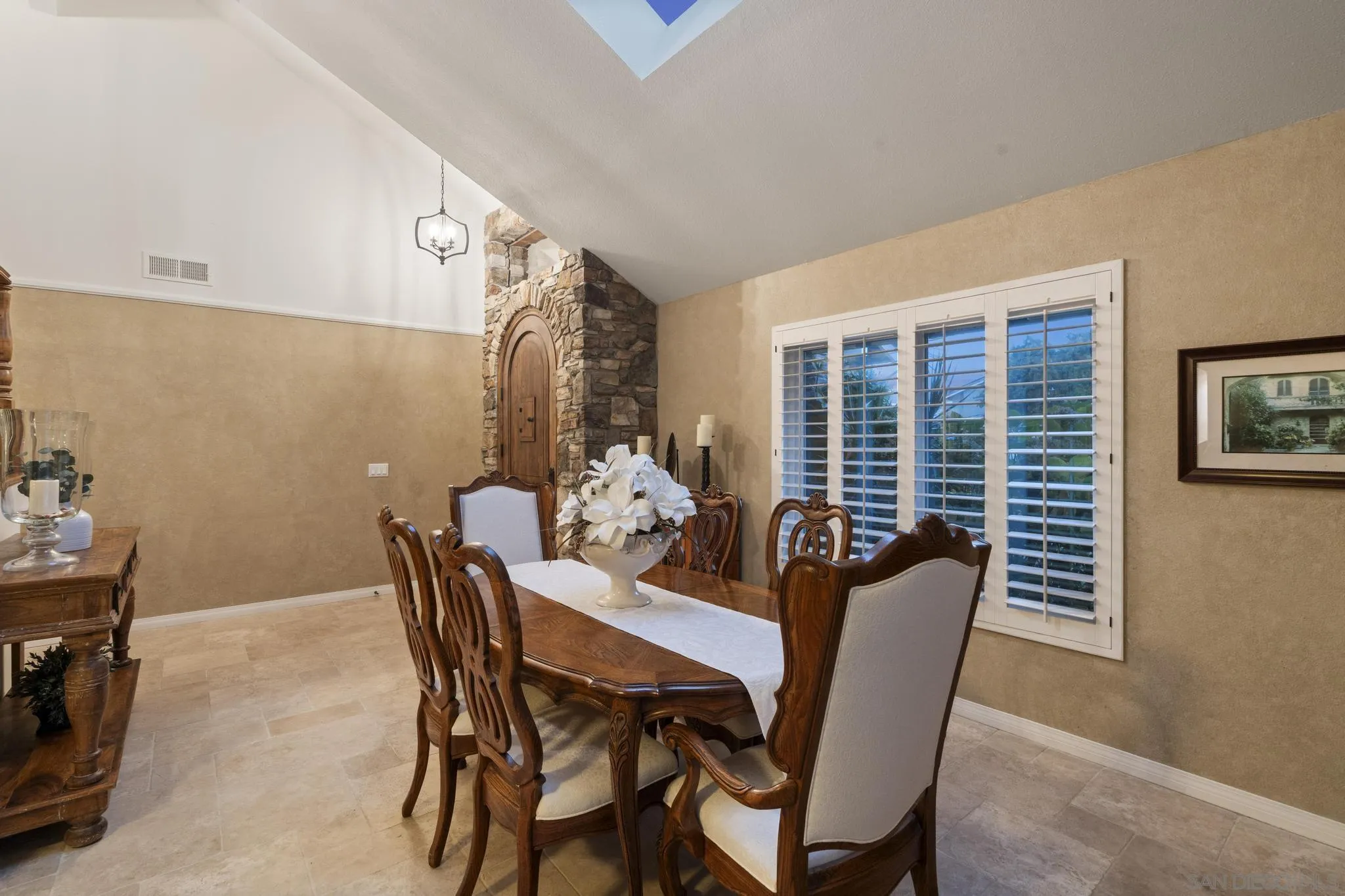 6502 La Paloma Street Carlsbad, CA 92009 - Photo 23 of 60 a view of a dining room with furniture and window