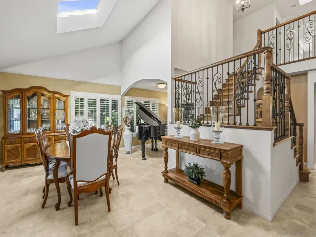 a view of entryway with flower plants