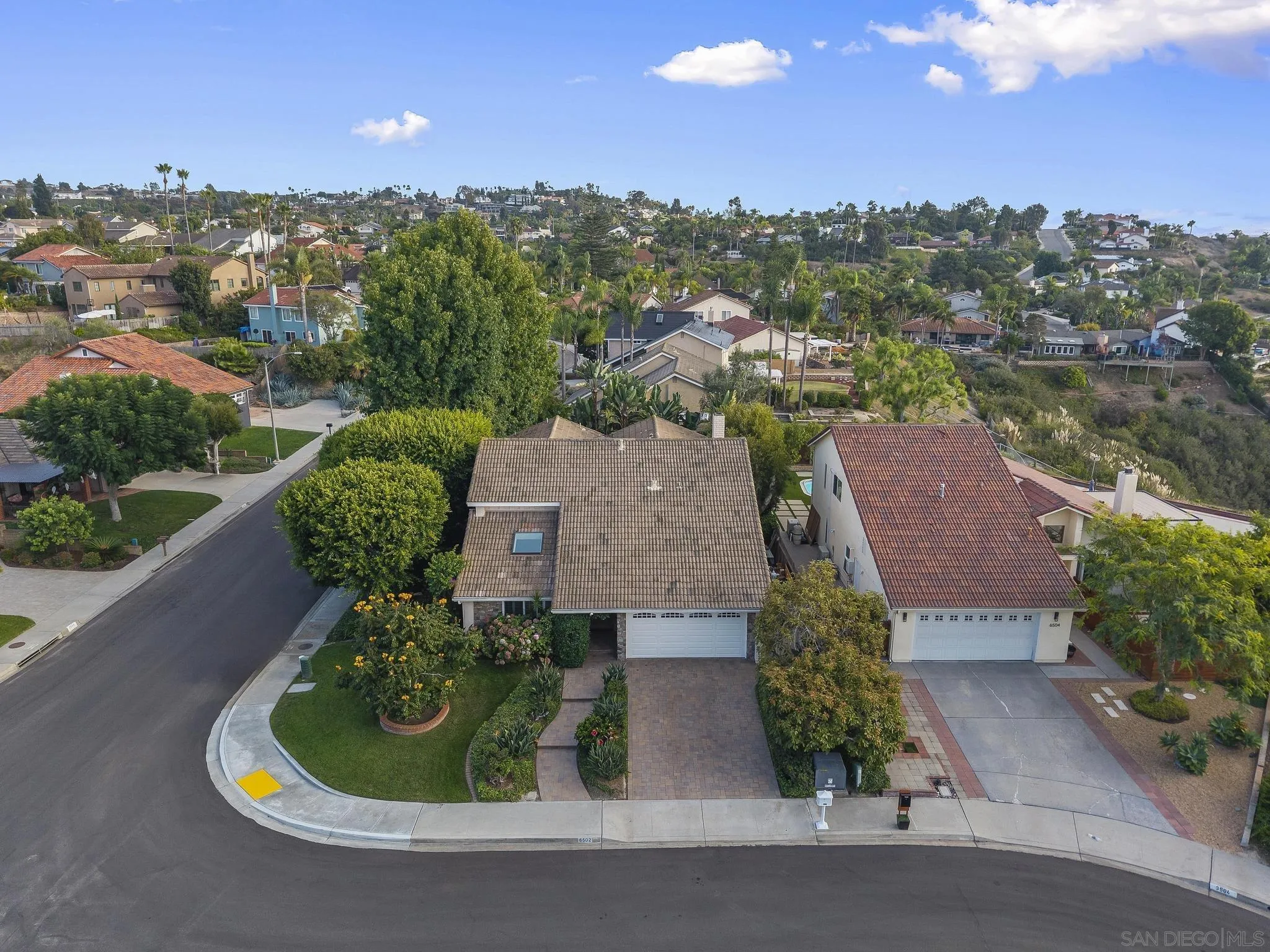 6502 La Paloma Street Carlsbad, CA 92009 - Photo 53 of 60 an aerial view of a house with garden space and street view
