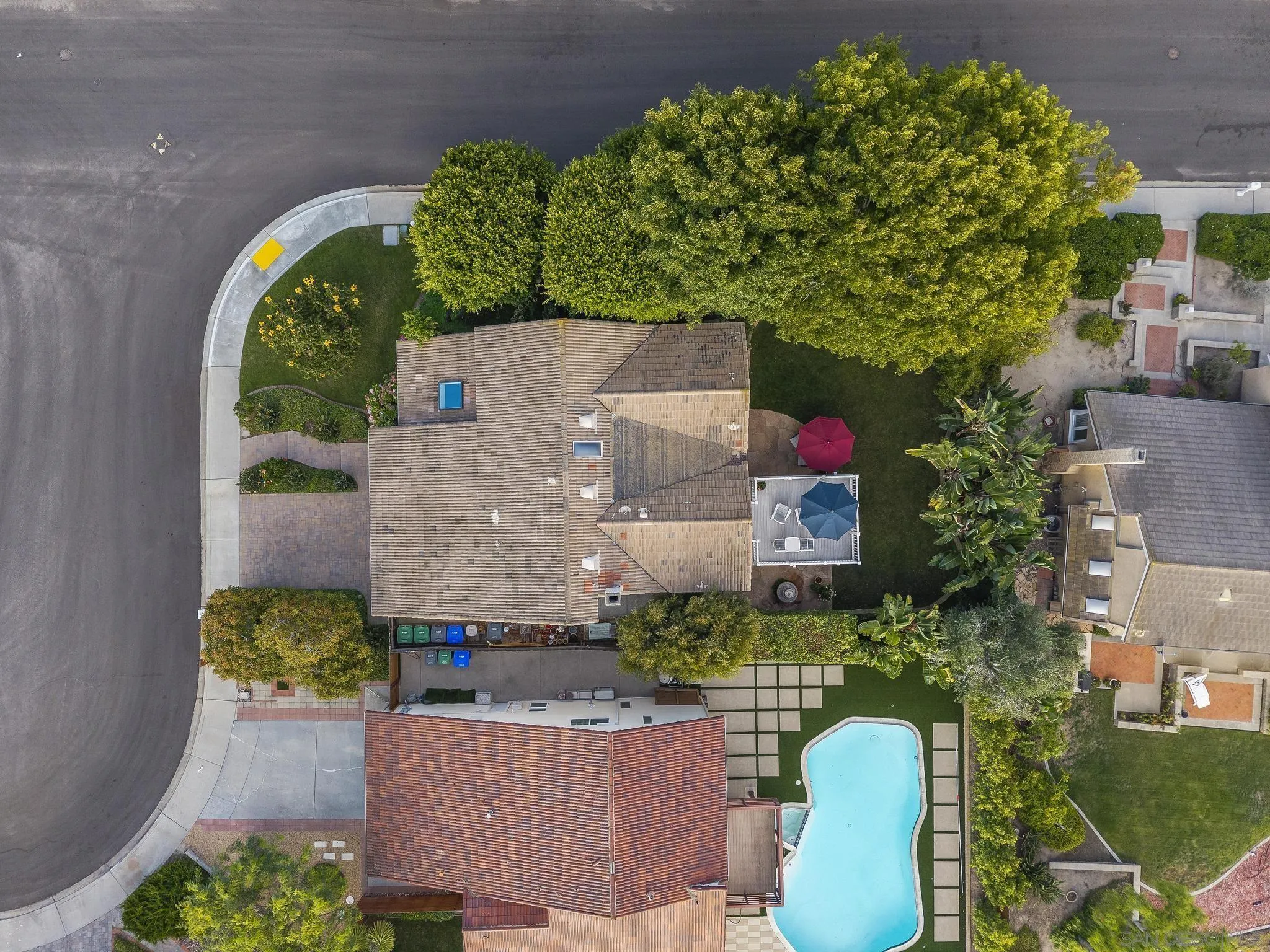 6502 La Paloma Street Carlsbad, CA 92009 - Photo 56 of 60 an aerial view of a house with a garden and swimming pool