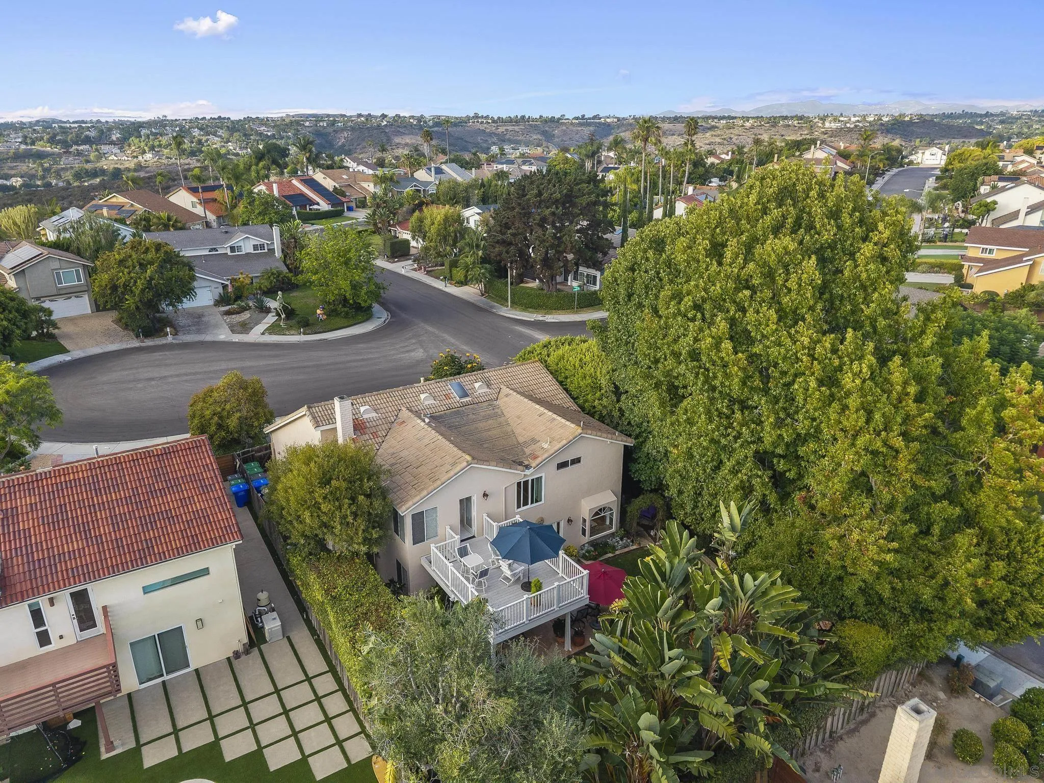 6502 La Paloma Street Carlsbad, CA 92009 - Photo 57 of 60 an aerial view of a house with lots of trees