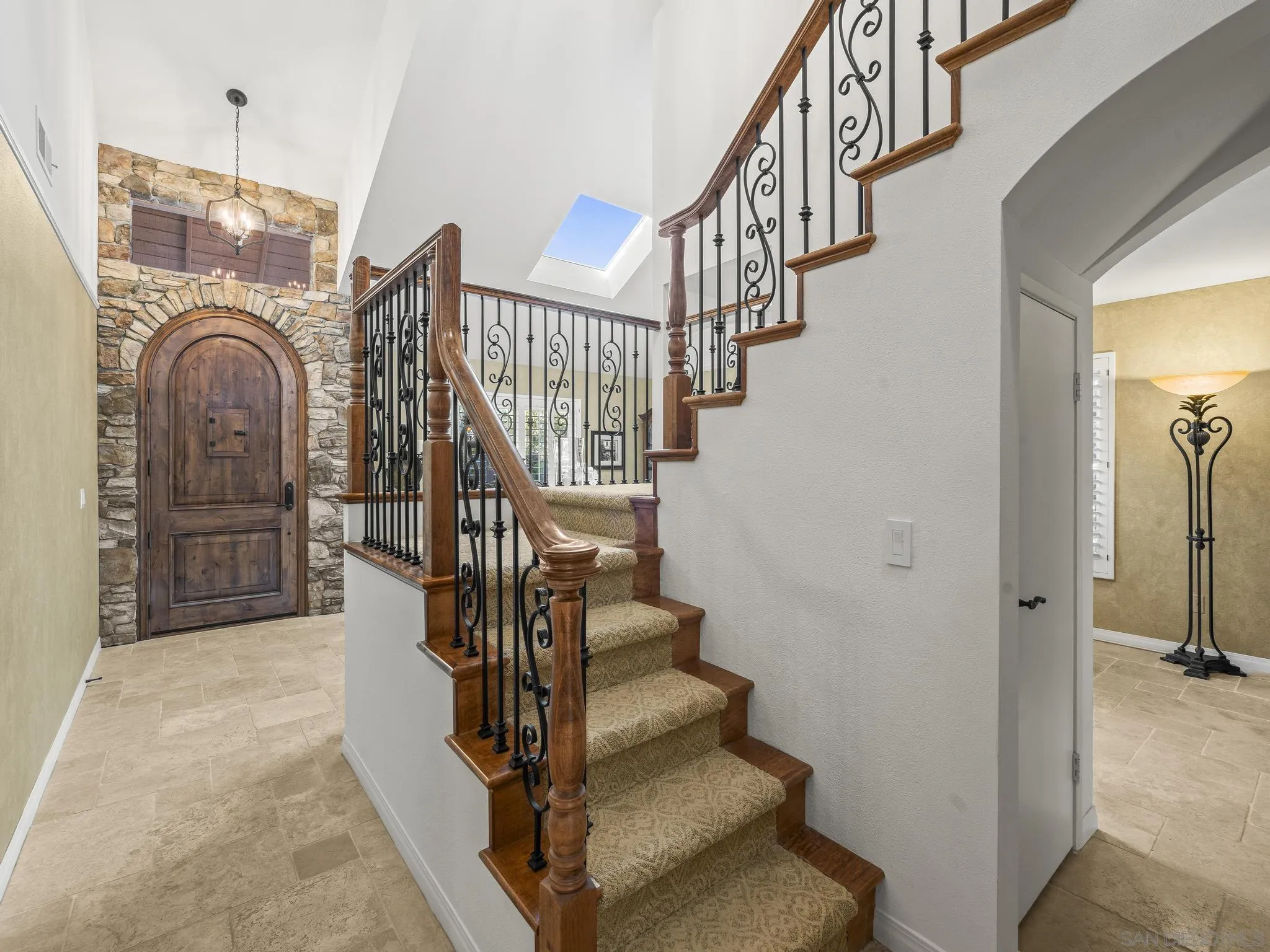 6502 La Paloma Street Carlsbad, CA 92009 - Photo 7 of 60 a view of entryway and hall with wooden floor