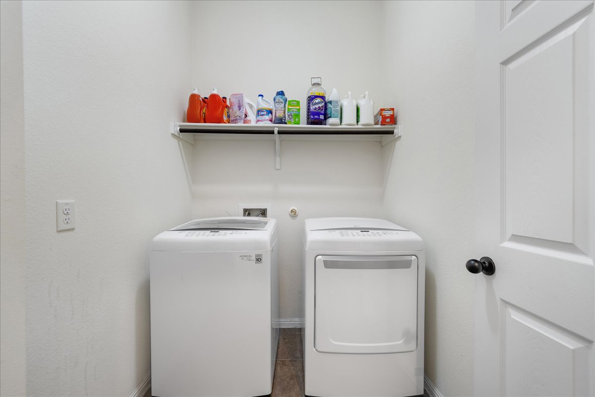 3000 Rio Verde Drive Leander, TX 78641 - Photo 17 of 23 a utility room with dryer and washer