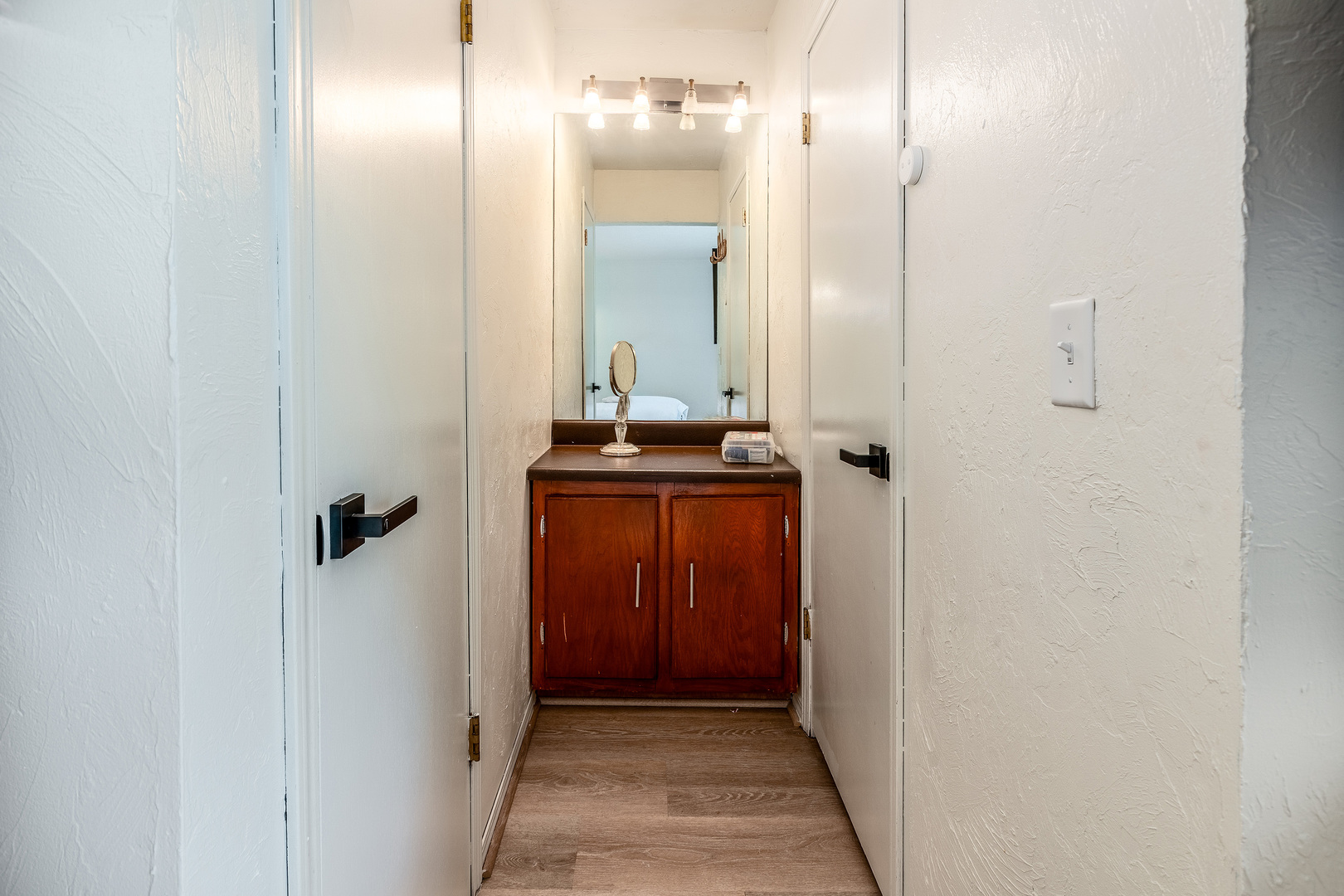 183 Heritage Road Carbondale, IL 62903 - Photo 22 of 44 a bathroom with a sink a mirror and shower