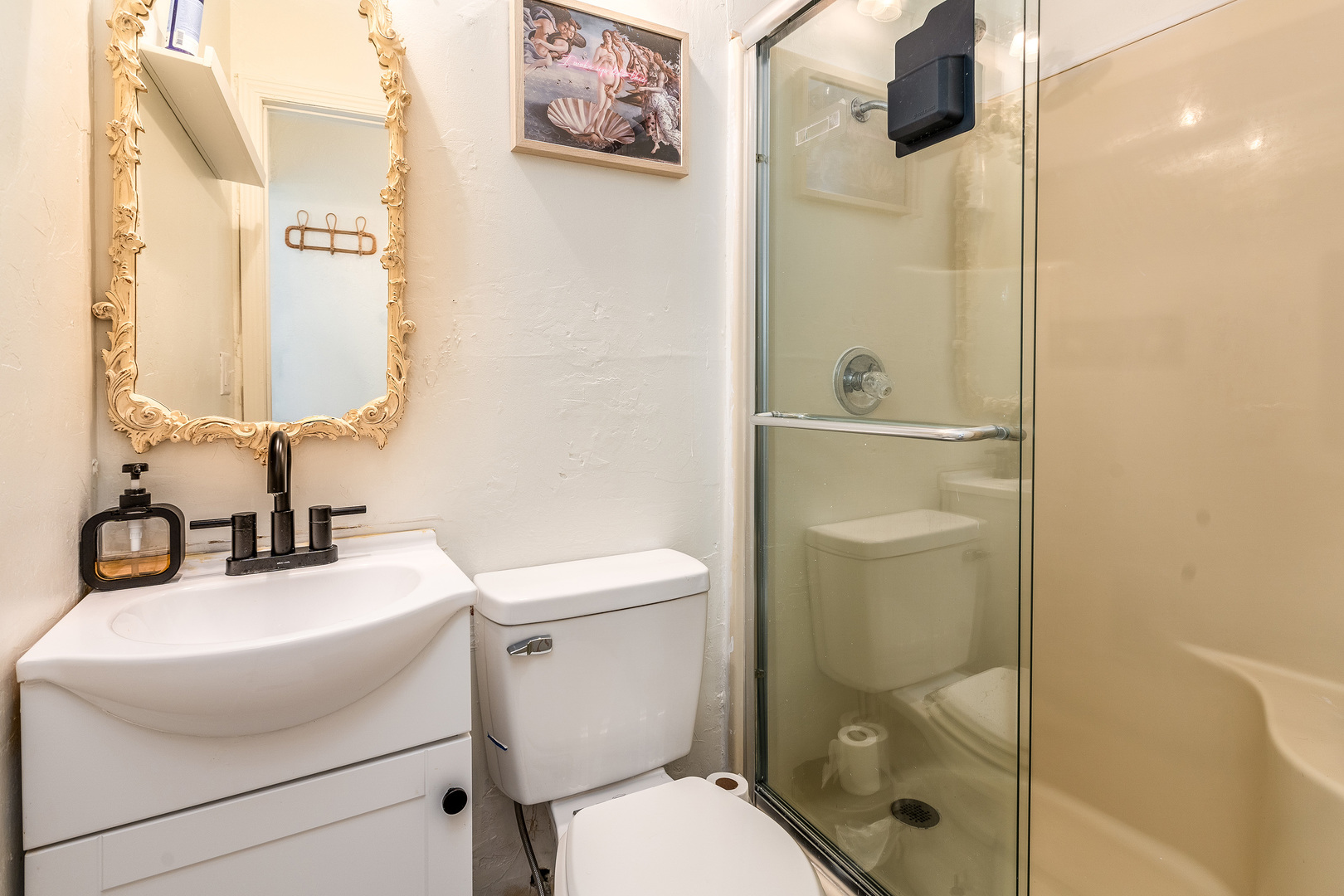 183 Heritage Road Carbondale, IL 62903 - Photo 23 of 44 a bathroom with a sink toilet and shower