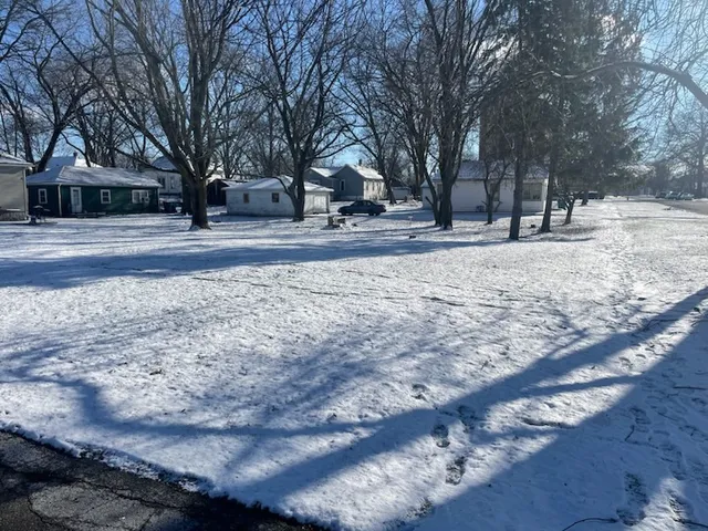a view of snow with yard
