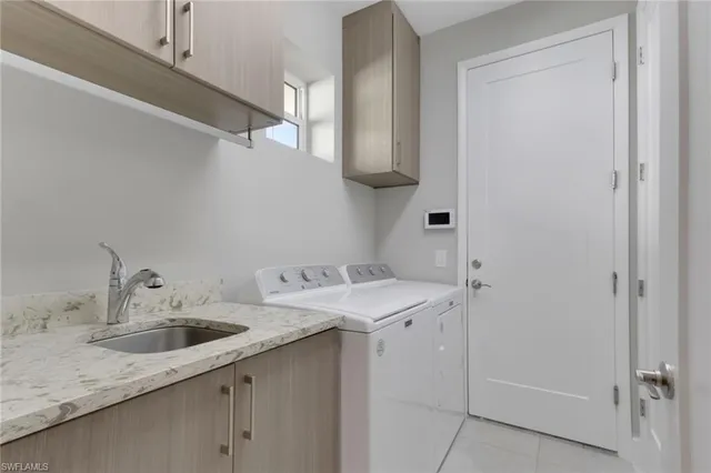 a bathroom with a sink and vanity