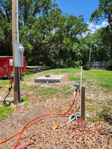 a view of a swimming pool with a patio