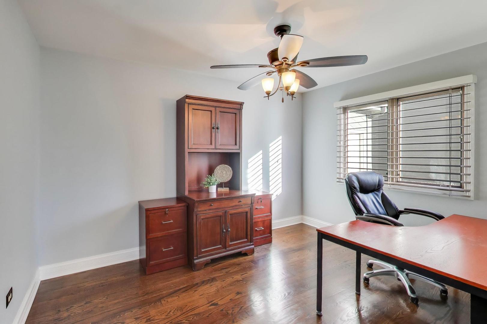 2103 Primrose Lane Naperville, IL 60565 - Photo 12 of 40 a view of a workspace with furniture and a window