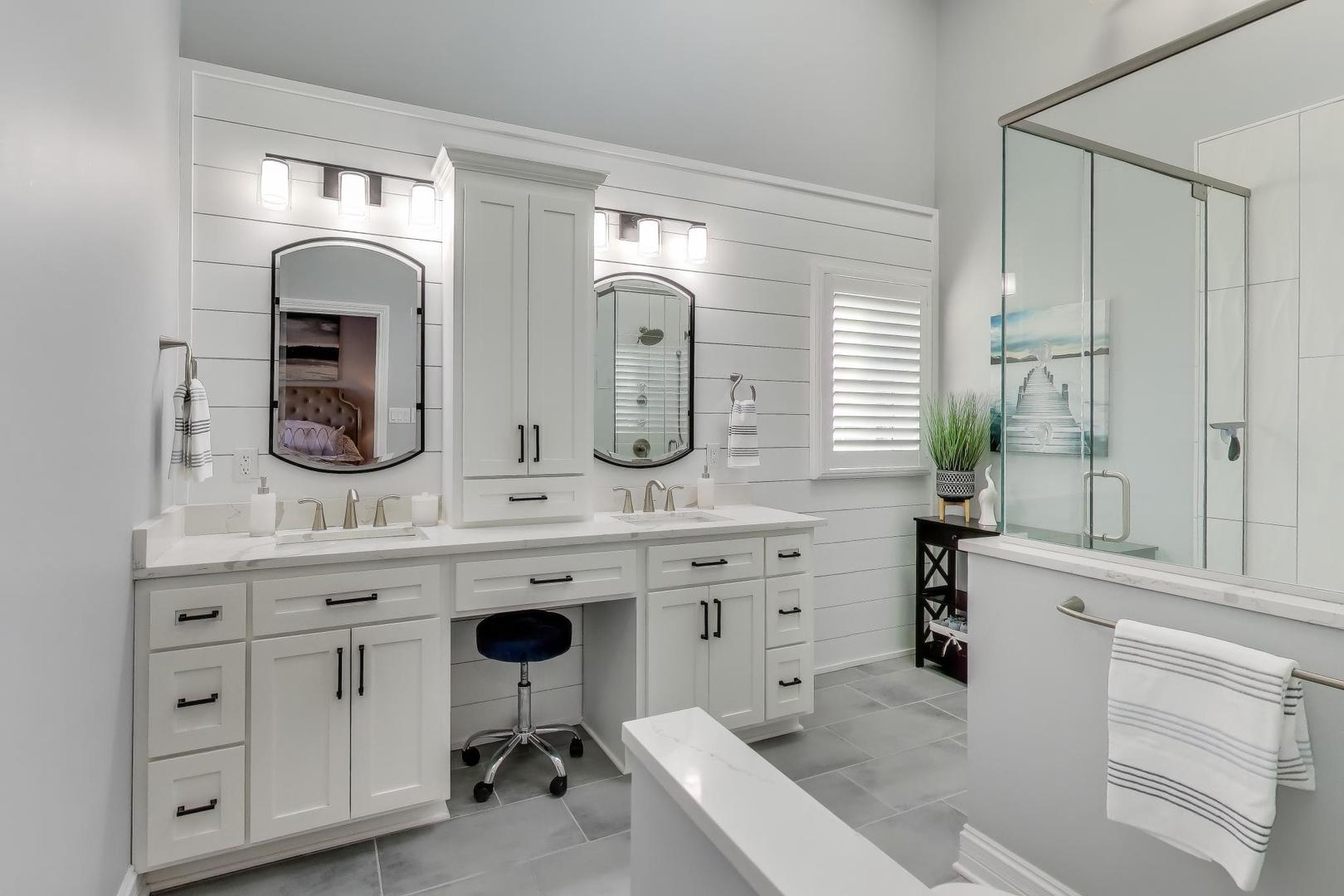 2103 Primrose Lane Naperville, IL 60565 - Photo 17 of 40 a spacious bathroom with a granite countertop sink and a mirror