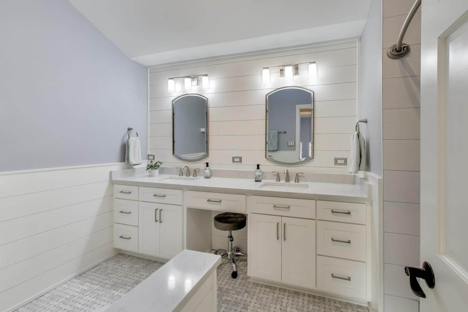 2103 Primrose Lane Naperville, IL 60565 - Photo 21 of 40 a bathroom with double sink and a mirror