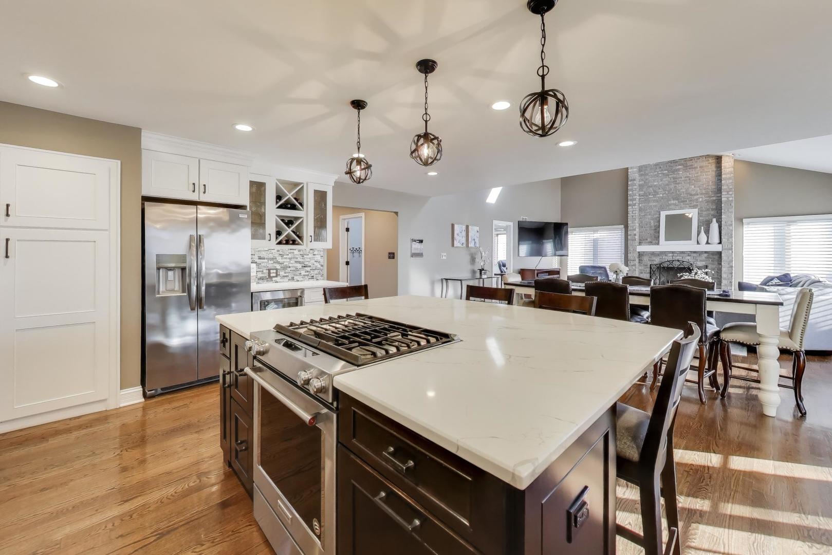 2103 Primrose Lane Naperville, IL 60565 - Photo 7 of 40 a kitchen that has a table and chairs in it