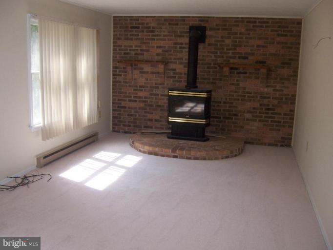 2704 Overview Road Hampstead, MD 21074 - Photo 2 of 12 a view of empty room with a fireplace