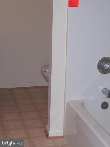 2704 Overview Road Hampstead, MD 21074 - Photo 12 of 12 a bathroom with a tub