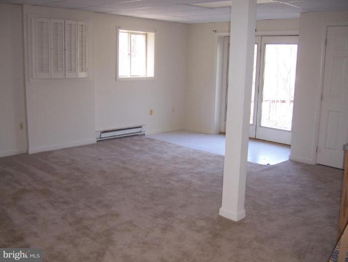 2704 Overview Road Hampstead, MD 21074 - Photo 4 of 12 an empty room with windows