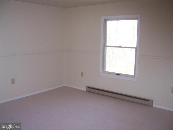2704 Overview Road Hampstead, MD 21074 - Photo 6 of 12 an empty room with a window