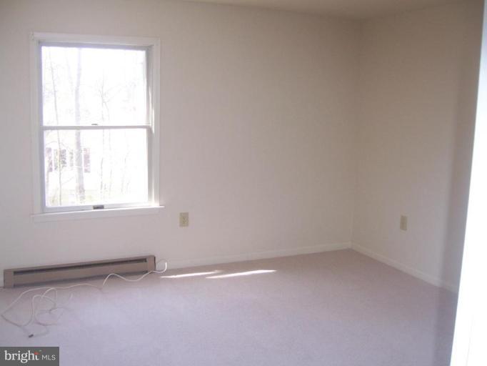 2704 Overview Road Hampstead, MD 21074 - Photo 7 of 12 an empty room with a window