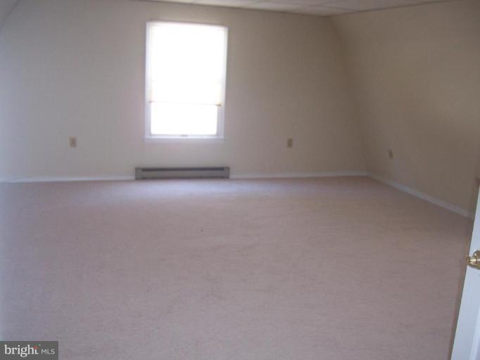 2704 Overview Road Hampstead, MD 21074 - Photo 8 of 12 an empty room with a window