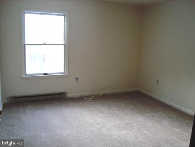 2704 Overview Road Hampstead, MD 21074 - Photo 9 of 12 an empty room with a window