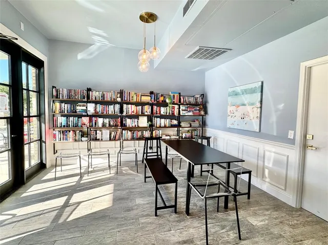 a view of a dining room with furniture