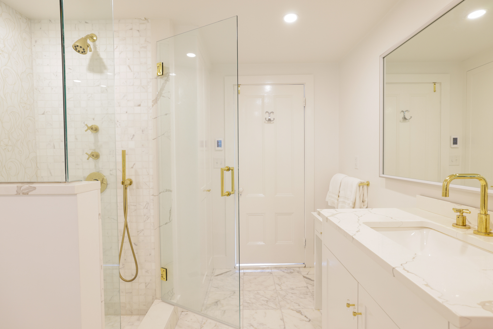 12 Hussey Street Nantucket, MA 02554 - Photo 24 of 47 a bathroom with a granite countertop shower sink and mirror