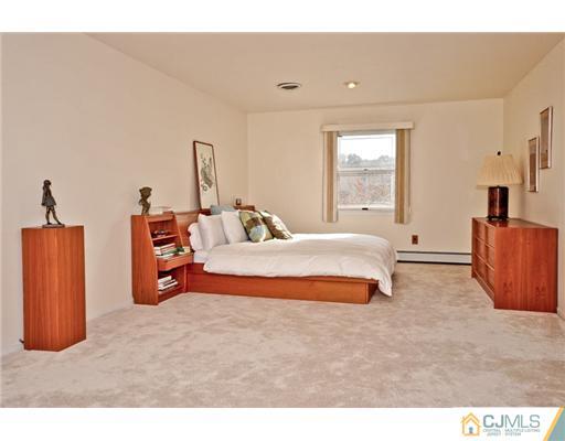 190 Friendship Road Cranbury, NJ 08512 - Photo 14 of 24 a bedroom with bed and window