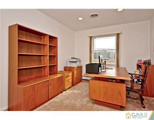 190 Friendship Road Cranbury, NJ 08512 - Photo 15 of 24 a room with furniture a window and bookshelf