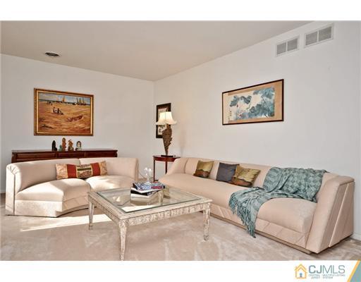 190 Friendship Road Cranbury, NJ 08512 - Photo 7 of 24 a living room with furniture and a couch