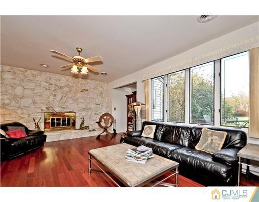 190 Friendship Road Cranbury, NJ 08512 - Photo 9 of 24 a living room with furniture and a large window
