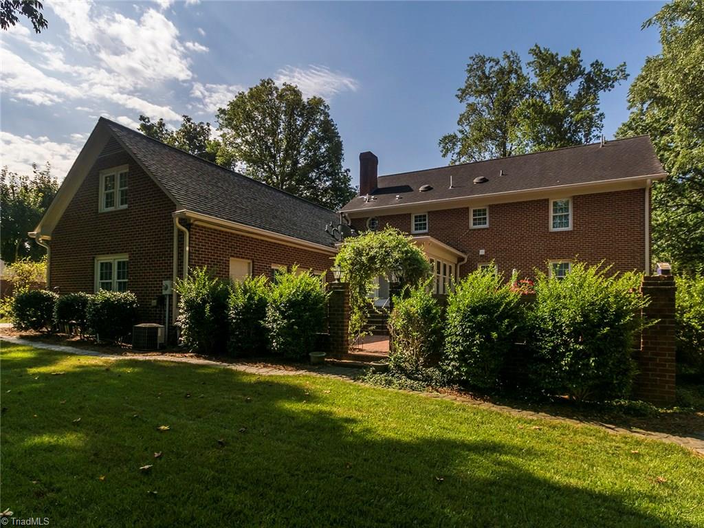 508 Hobbs Road Greensboro, NC 27403 - Photo 2 of 3 Even with stately and expansive full brick patio there's still plenty of play space for the younger or furrier Wedgewood residents!