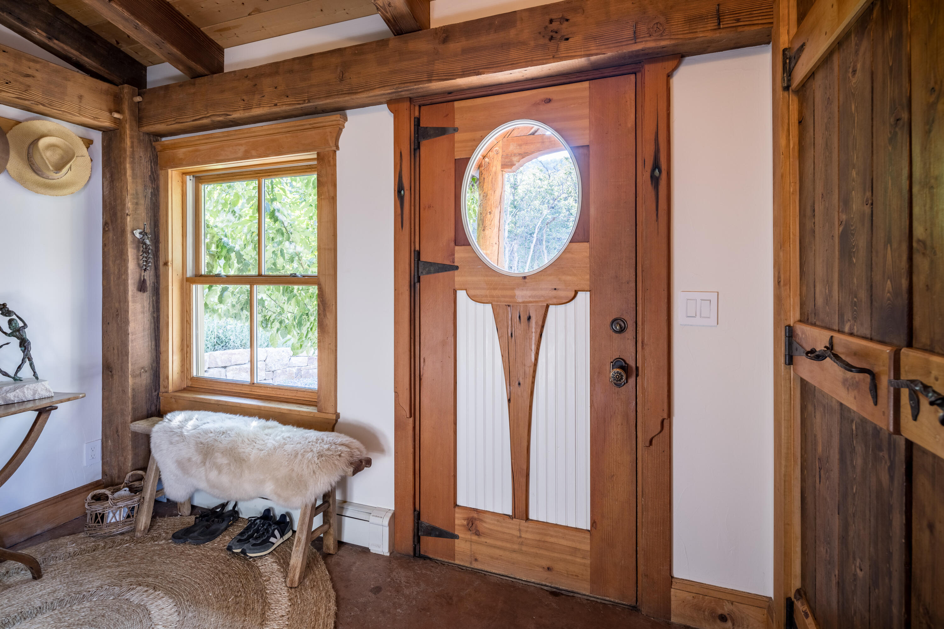 462 Dragon Lode Drive Placerville, CO 81430 - Photo 11 of 46 a view of a hallway with furniture and a window