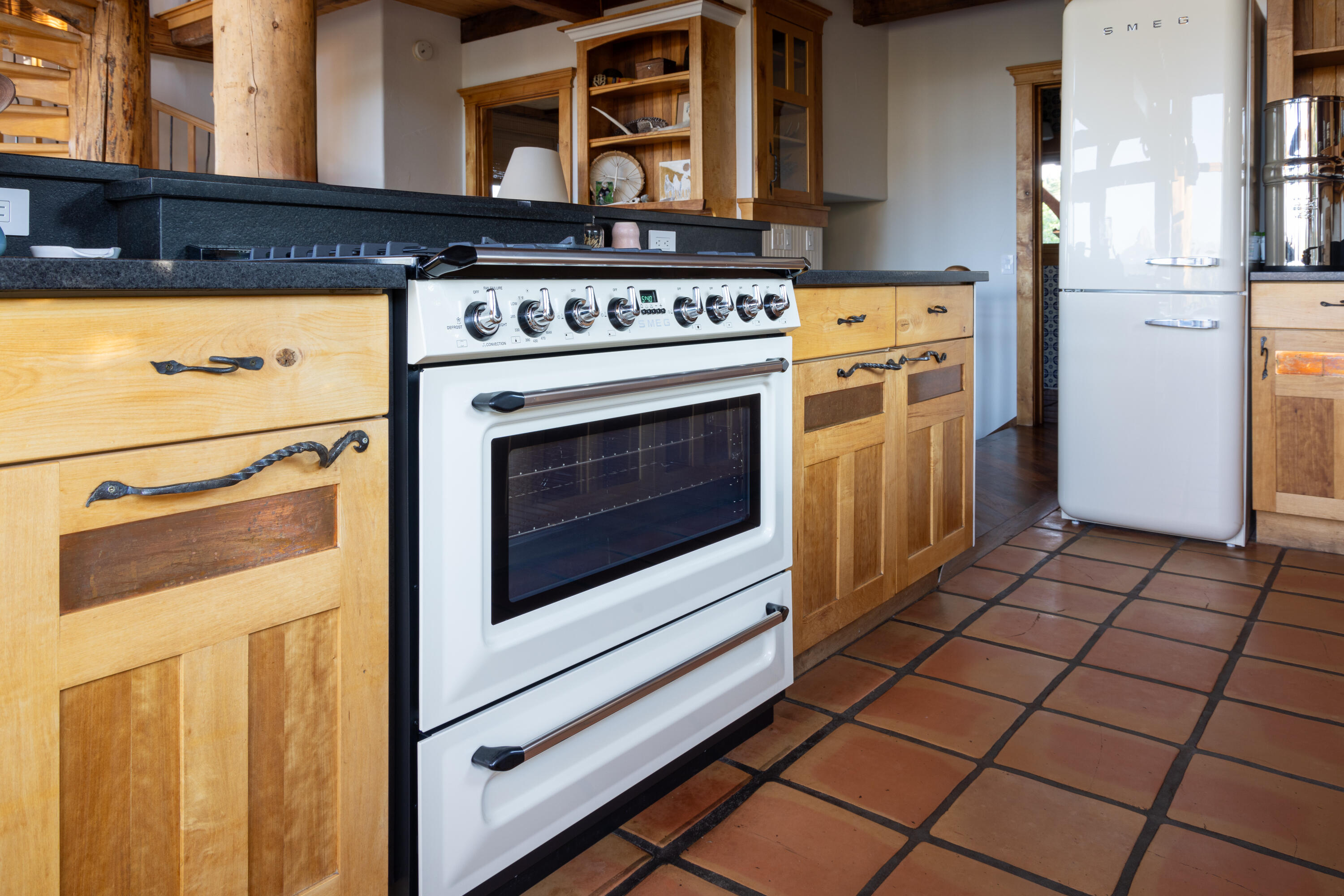 462 Dragon Lode Drive Placerville, CO 81430 - Photo 18 of 46 a stove top oven sitting inside of a kitchen