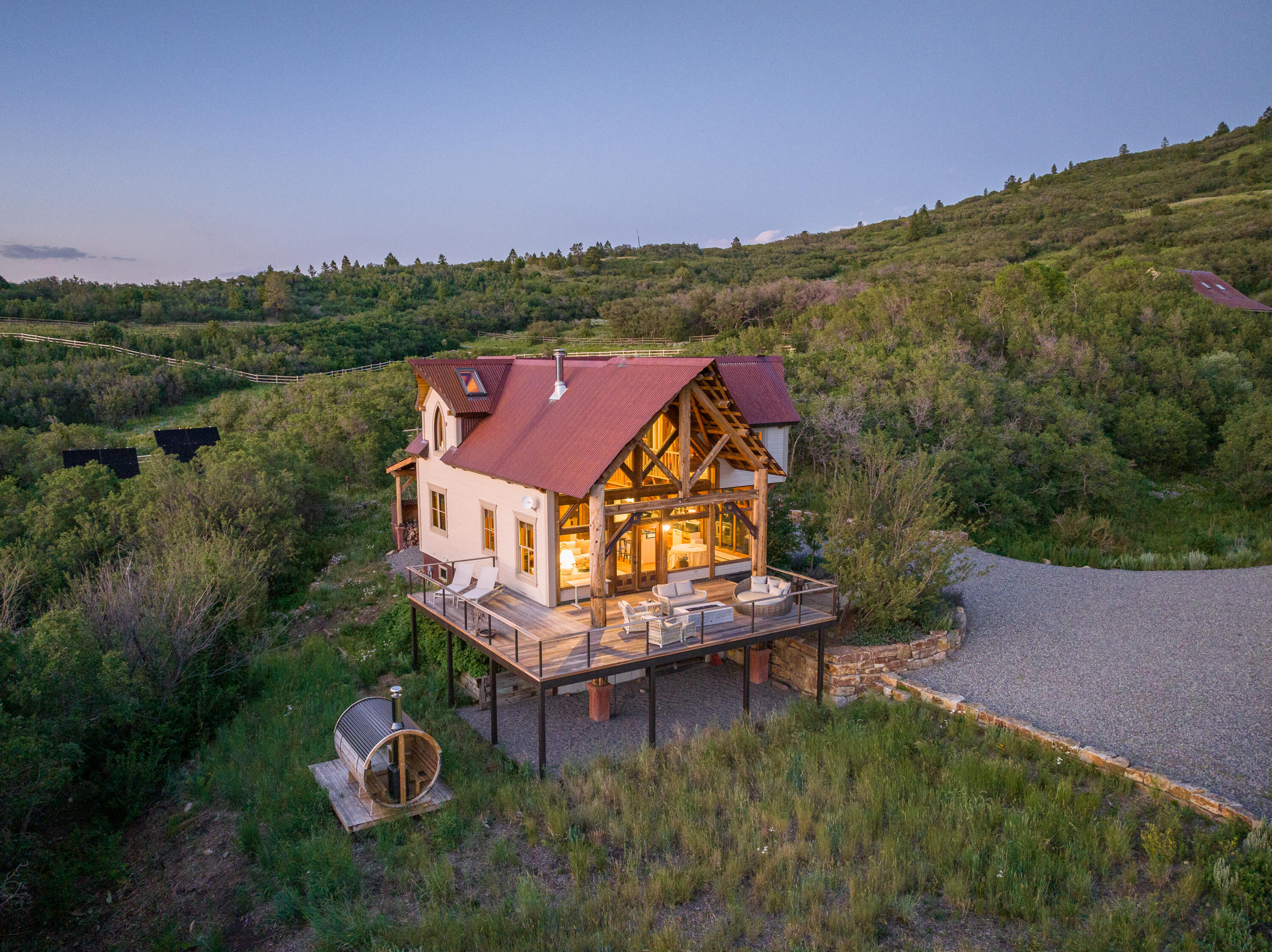 462 Dragon Lode Drive Placerville, CO 81430 - Photo 2 of 46 an aerial view of a house with a garden