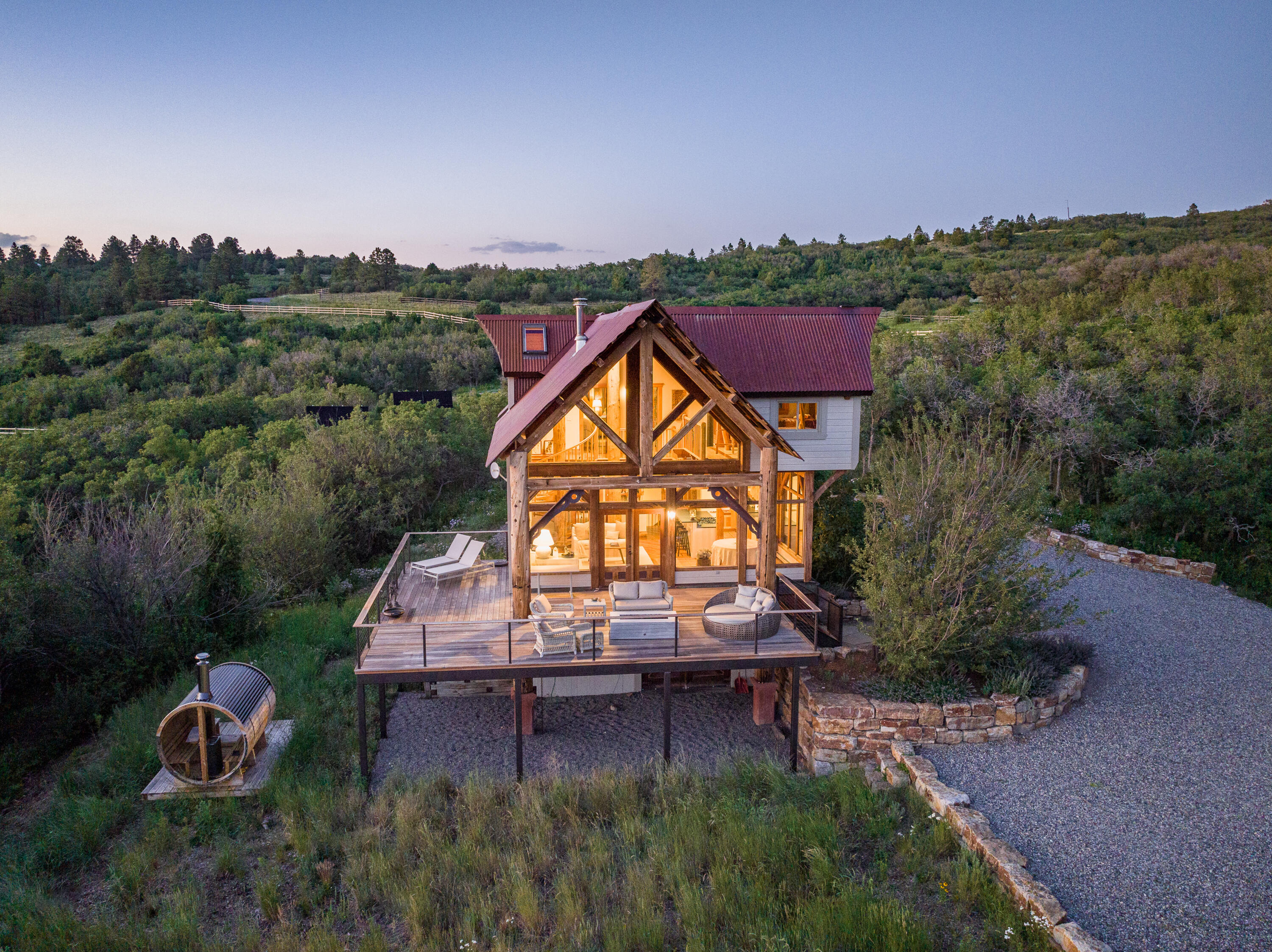 462 Dragon Lode Drive Placerville, CO 81430 - Photo 5 of 46 an aerial view of a house with a garden and lake view