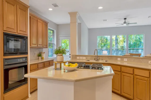 a bathroom with a sink vanity and a mirror