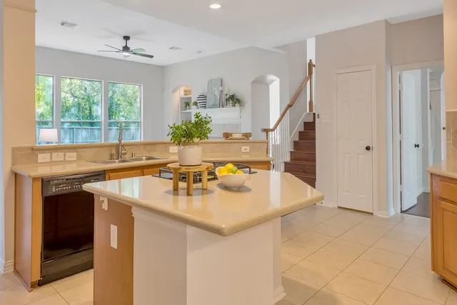 a bathroom with a sink vanity and a mirror