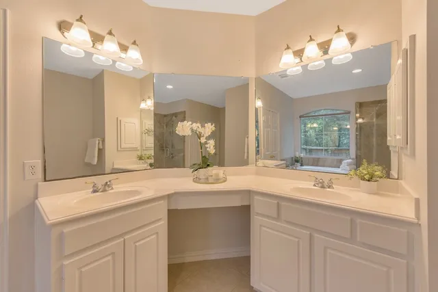 a view of an empty room and a window