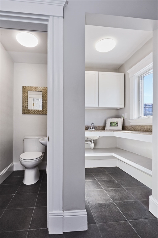 290 North Street, Unit 4 Boston, MA 02113 - Photo 16 of 28 a bathroom with a toilet and a bathtub