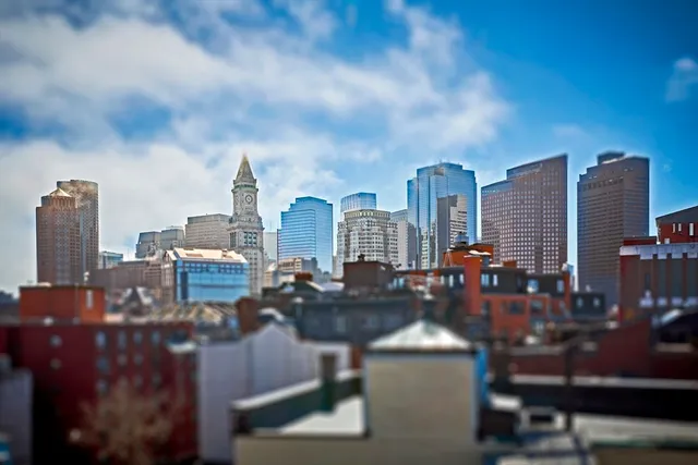 a view of a city with tall buildings