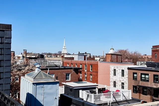 a view of a city with tall buildings