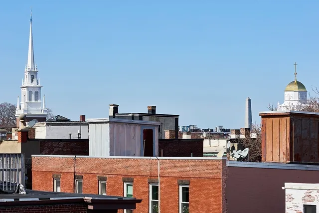 a kitchen view with a sink and a stove
