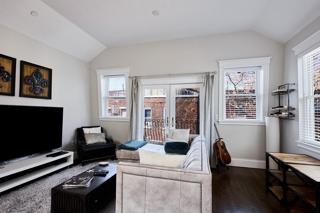 290 North Street, Unit 4 Boston, MA 02113 - Photo 5 of 28 a view of a livingroom with workspace and a window