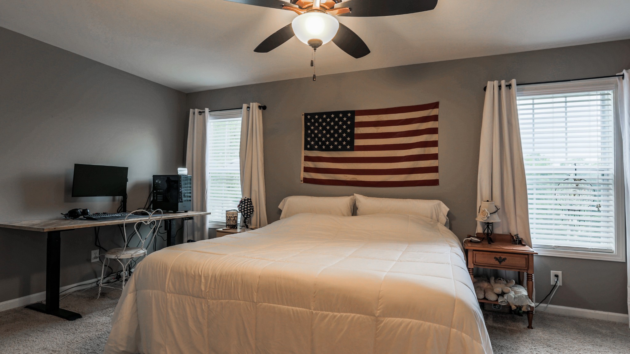 7993 Shoals Branch Road Primm Springs, TN 38476 - Photo 14 of 25 a bedroom with a bed and a chandelier