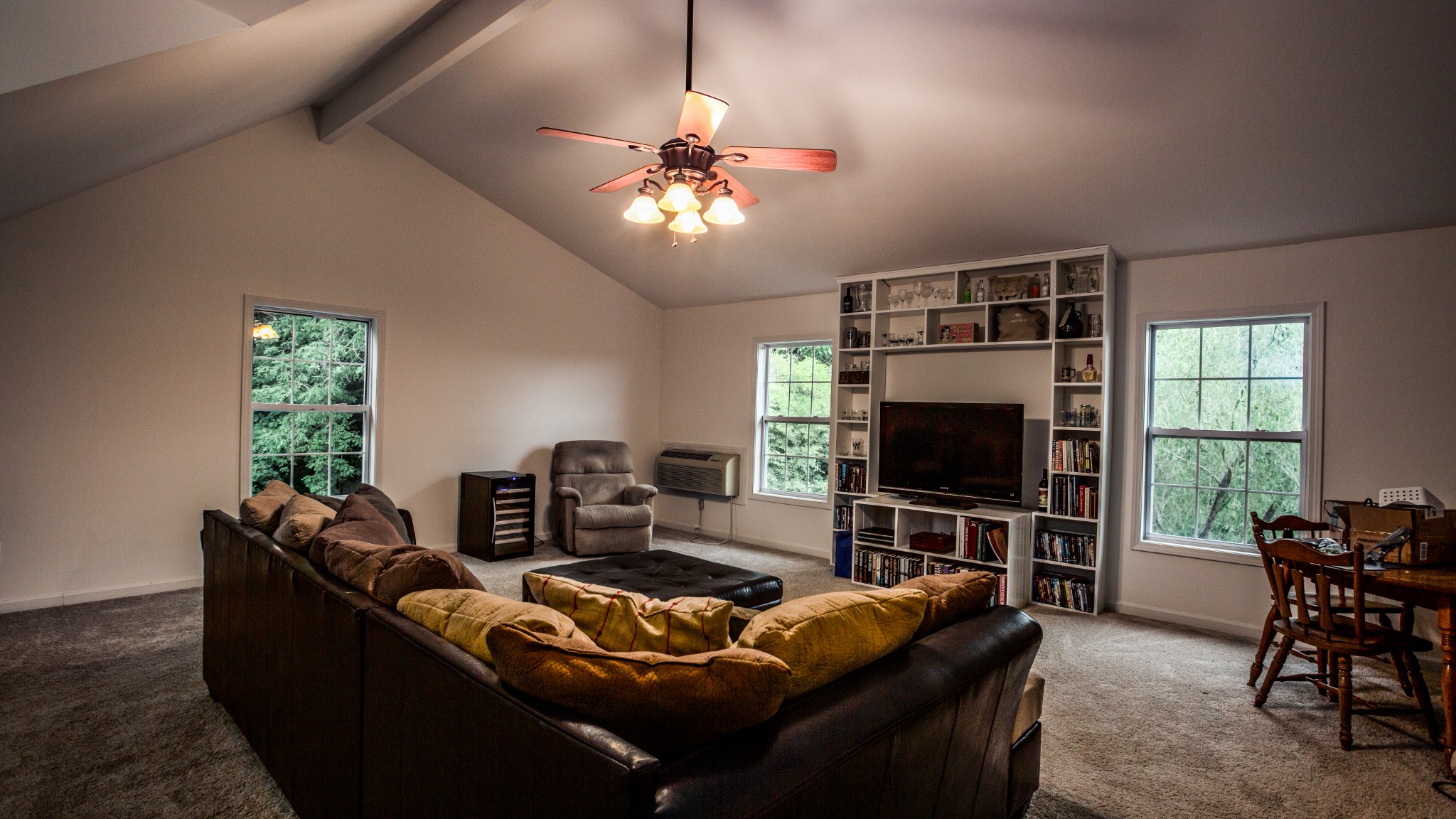 7993 Shoals Branch Road Primm Springs, TN 38476 - Photo 25 of 25 a living room with furniture and a flat screen tv